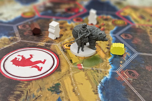 scythe board game miniatures on the playing board